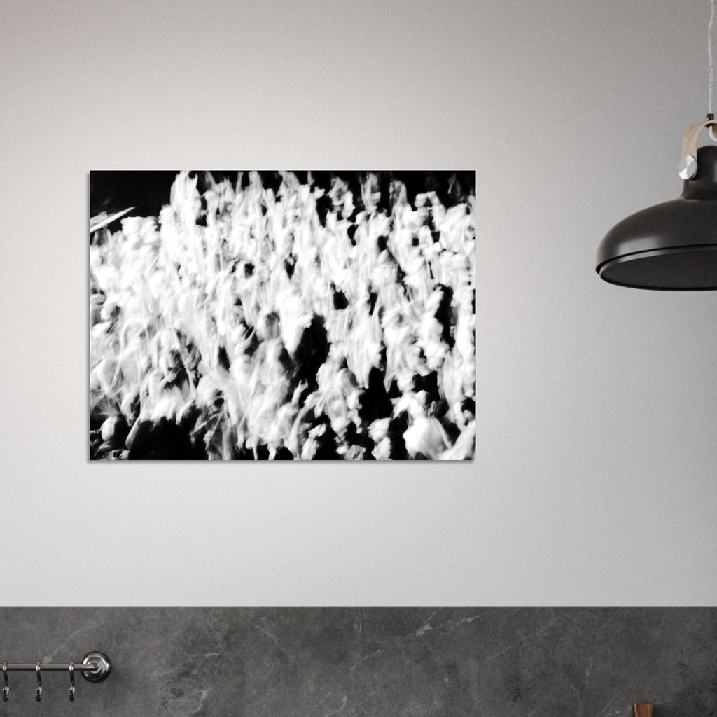 Abstract black and white film photograph of a moving crowd with motion blur