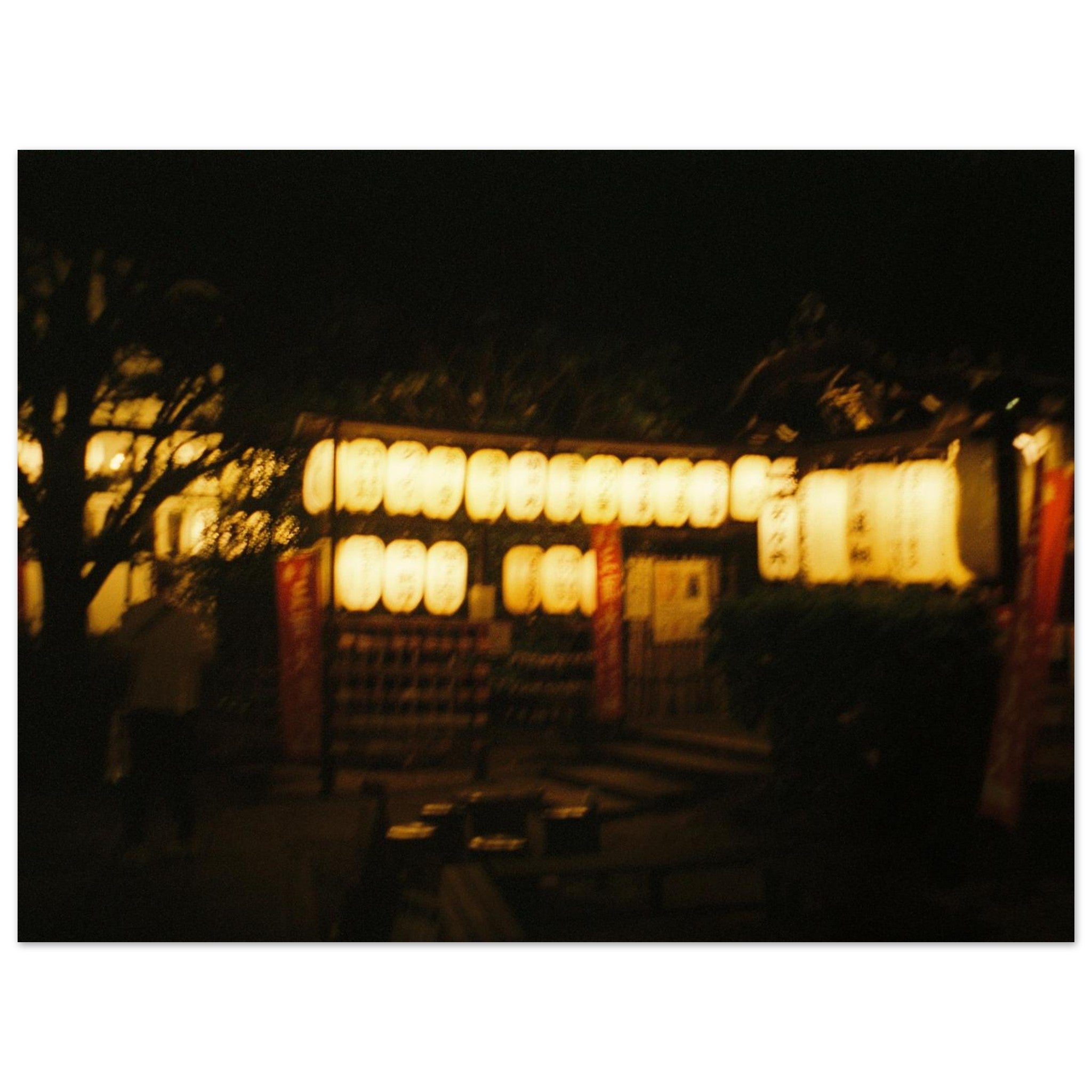 Decorative lanterns at night with a dark background in Kyoto, Japan